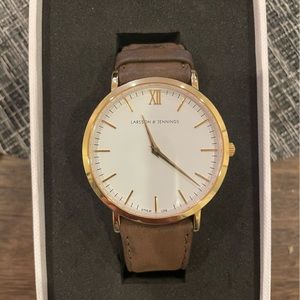 Larsson & Jennings gold rimmed watch watch w/ brown suede band-great condition!